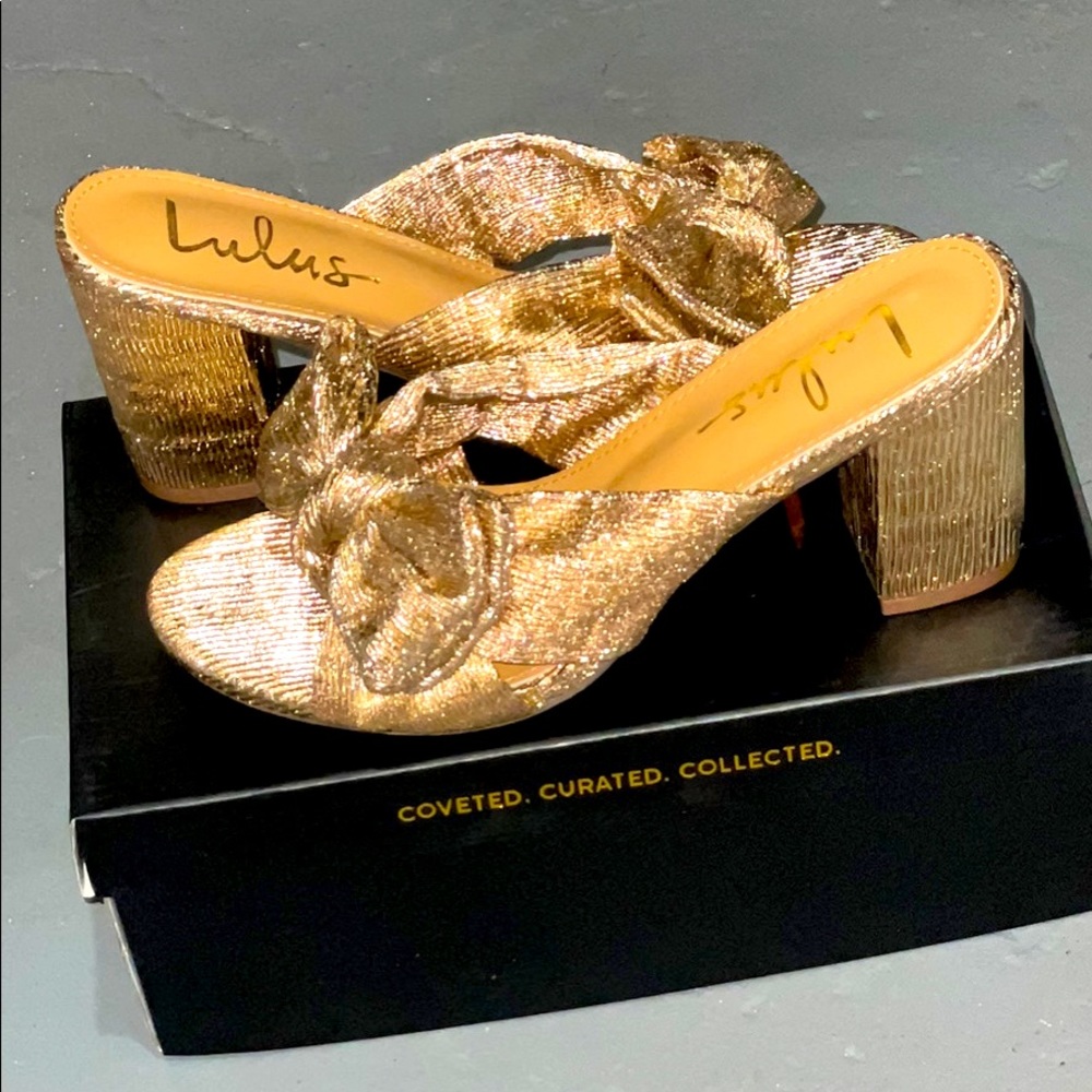 Size 8 rose gold metallic slip on sandals with bow. New and never worn.